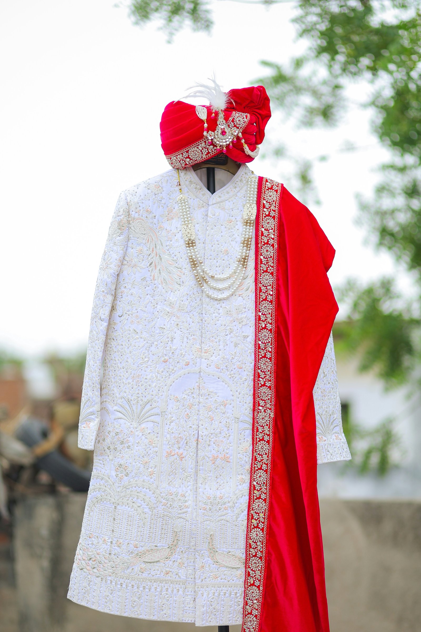 Embroidered Indian sherwani with turban tailored by Royal Design's